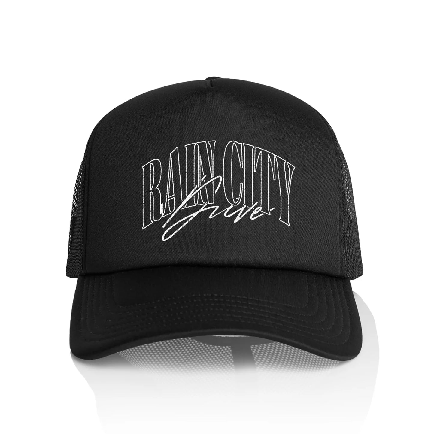 A black Rain City Drive AS Colour trucker hat with white mesh sides and RAIN CITY LIVE embroidered in bold, stylized white letters on the front.