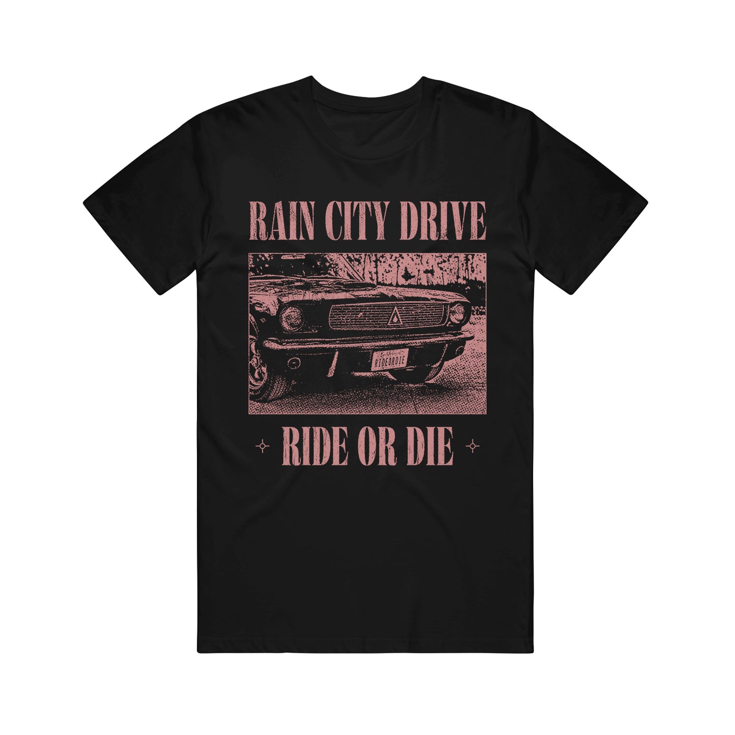 Rain City Drive Black T-Shirt showcasing a vintage car graphic with pink text—RAIN CITY DRIVE above, RIDE OR DIE below—and stylish lines beneath. Ideal for fans of unique, eye-catching printed tees.