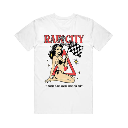 White Rain City Drive T-shirt with a cartoon pin-up woman in a bikini holding a checkered flag, “RAIN CITY Angel” above and “I WOULD BE YOUR RIDE OR DIE” below, detailed with bold red, black, and yellow accents.